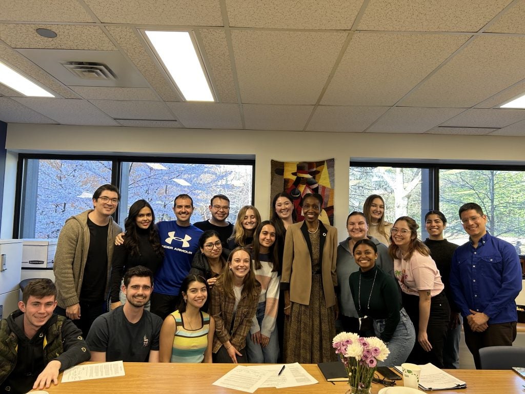 Ambassador Williams and students in a classroom.